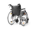 Empty modern wheelchair on white background