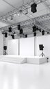 Empty modern white stage setup with metal truss lighting, speakers, and backdrop for event presentation. Royalty Free Stock Photo