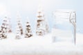Empty money jar in snow winter landscape