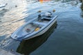 An empty motor boat drifting gently symbolizing solitude and the endless possibilities of exploration on peaceful waters. Motor Royalty Free Stock Photo