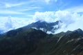 A empty mountain ridge in the andes with a stunning cloudscape and bright blue sky Royalty Free Stock Photo