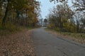 Empty mountain road at cloudy day during autumn time Royalty Free Stock Photo