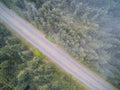 Empty mountain road in a misty morning Royalty Free Stock Photo