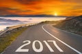 Empty mountain road to upcoming 2017 at sunset Royalty Free Stock Photo