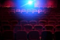 Empty movie theater with projection light Royalty Free Stock Photo