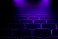 Empty movie theater with projection light falling into the lens Royalty Free Stock Photo