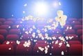 Empty movie theater with projection light falling into the lens and empty seats, popcorn explosion. Vector Illustration Royalty Free Stock Photo