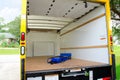 Empty moving truck with dolly in back Royalty Free Stock Photo
