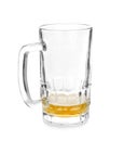 Almost empty mug of cold beer on white background Royalty Free Stock Photo