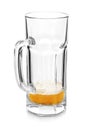 Almost empty mug of cold beer on white background Royalty Free Stock Photo