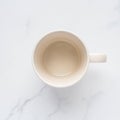 Empty Mug on Marble Background Royalty Free Stock Photo