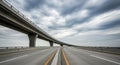 Empty Multi- Lane Highway Overpass with Dramatic Cloudy Sky road bridge Royalty Free Stock Photo