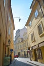 almost empty narrow street of Prague which is a not so popular destination of tourist in the capital city of Czech Republic Royalty Free Stock Photo