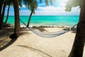 Empty net hammock at tropical beach resort Royalty Free Stock Photo