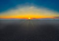 Empty new asphalt road made of black bitumen and magnificent dawn landscape