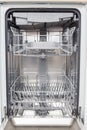 Empty new dishwasher with open door Royalty Free Stock Photo