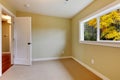 Empty new green room with beige carpet.