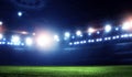 Empty night football arena in lights Royalty Free Stock Photo