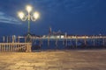 Empty, no tourists Venice. Gondolas moored by Saint Mark square with San Giorgio di Maggiore church Royalty Free Stock Photo