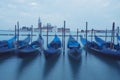 Empty, no tourists Venice. Gondolas moored by Saint Mark square with San Giorgio di Maggiore church Royalty Free Stock Photo