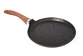 Empty nonstick pan with handle for baking pancakes, isolated on white, shallow depth of field