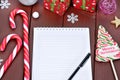 Empty notebook with christmas ornament