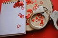 empty notebook next to handcuffs Royalty Free Stock Photo
