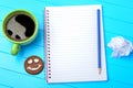 Empty notebook with pencil and biscuit Royalty Free Stock Photo