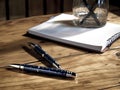 Empty notebook stylish pen wooden surface