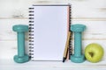 Empty Notebook for Workout Plan   Apple and Hand Weights Royalty Free Stock Photo