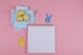 Empty notepad mask and Easter bunny with eggs Royalty Free Stock Photo