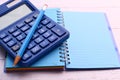 Empty notepad with pencil and calculator wooden background Royalty Free Stock Photo