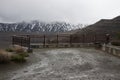 Empty observation deck in the mountains. Stormy weather, low clo Royalty Free Stock Photo