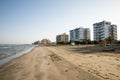 Empty off season Kastela beach in Larnaca with residential apartment blocks