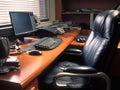 Empty office chair with computer and accessories
