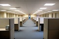 empty office cubicles with moving tags