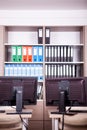 Empty office room with computers and desks Royalty Free Stock Photo