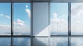 Empty office space with large windows overlooking city skyline and blue sky Royalty Free Stock Photo