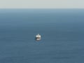 Empty oil tanker alone in the middle of calm ocean Royalty Free Stock Photo