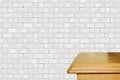 Empty old brown corner wood table with blurred gray concrete block brick wall with copy space, display montage for product Royalty Free Stock Photo