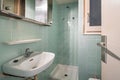 Empty, old and dirty bathroom with blue tiles in an old house of Barcelona Royalty Free Stock Photo