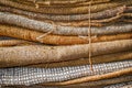 Empty old dirty jute sacks stacked Royalty Free Stock Photo