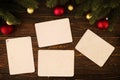 Empty old instant photos paper on wood table in christmas. Royalty Free Stock Photo