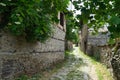 Empty old medieval path on antique residential village in past eastern europe town.