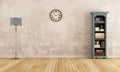 Empty old room with little bookcase Royalty Free Stock Photo