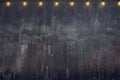Empty old rustic grunge concrete wall with light bulb string par