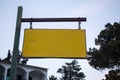 Empty Old Street Name Signage. Suspended from Entangled Chain and Rustic Steel Pole Horizontally. Close Up View of Royalty Free Stock Photo