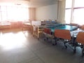 Empty old vintage hospital bed near window