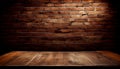 Empty Old wood table top with abstract old brick wall background. Royalty Free Stock Photo