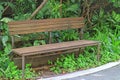 Empty old wooden bench in the garden Royalty Free Stock Photo